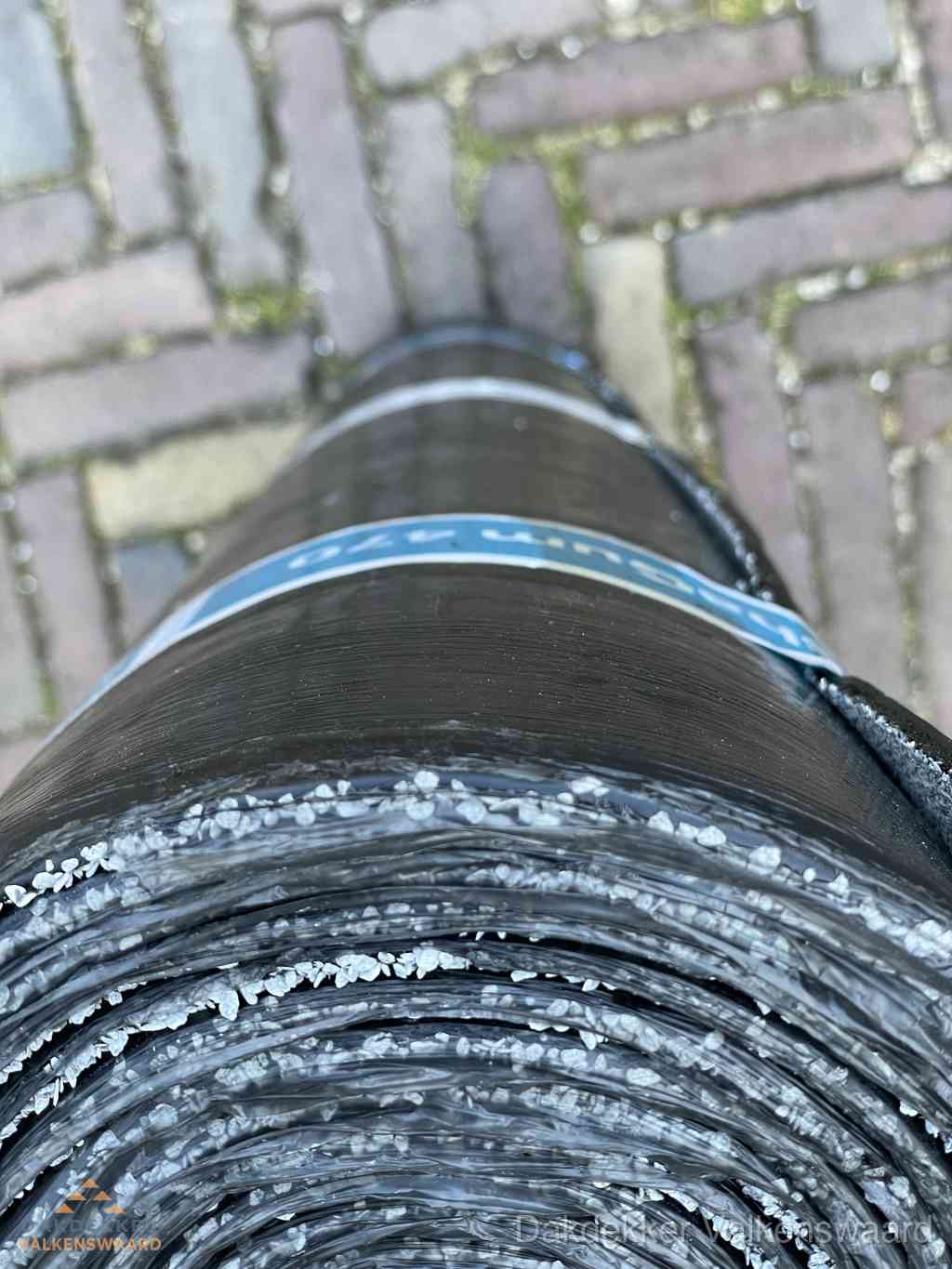 Rol bitumen dakleer met leislag voor plat dak in Valkenswaard